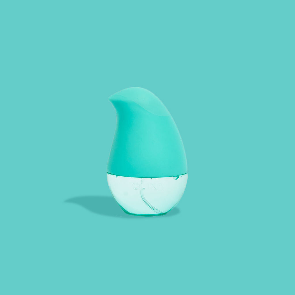 OLIKA Mint Citrus Refillable Hand Sanitizer Spray, Delivered in a Super Ergonomic and Oh So Touchable Design, Shop The Classic Spray Now 